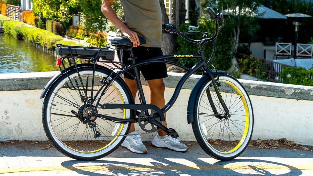 Man standing next to his EB11 City Cruiser eBike.