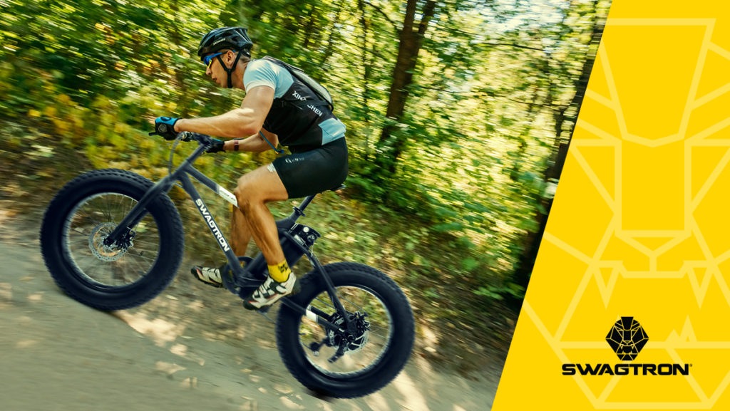 Man riding uphill on an EB8 Off-Road eBike.