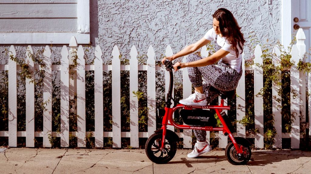 Woman sitting on her swagCYCLE Classic pedal-less eBike.