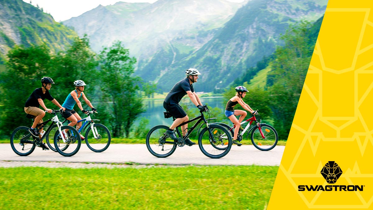 Family riding a scenic trail using their eBikes to help with Fitness.