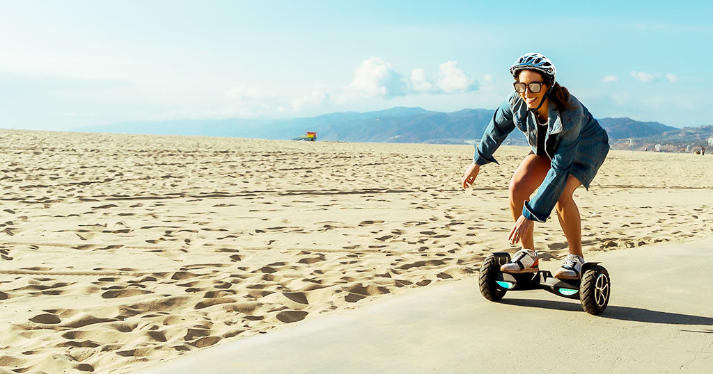 Hoverboard Holiday Guide, Female riding the Swagboard T6 Outlaw