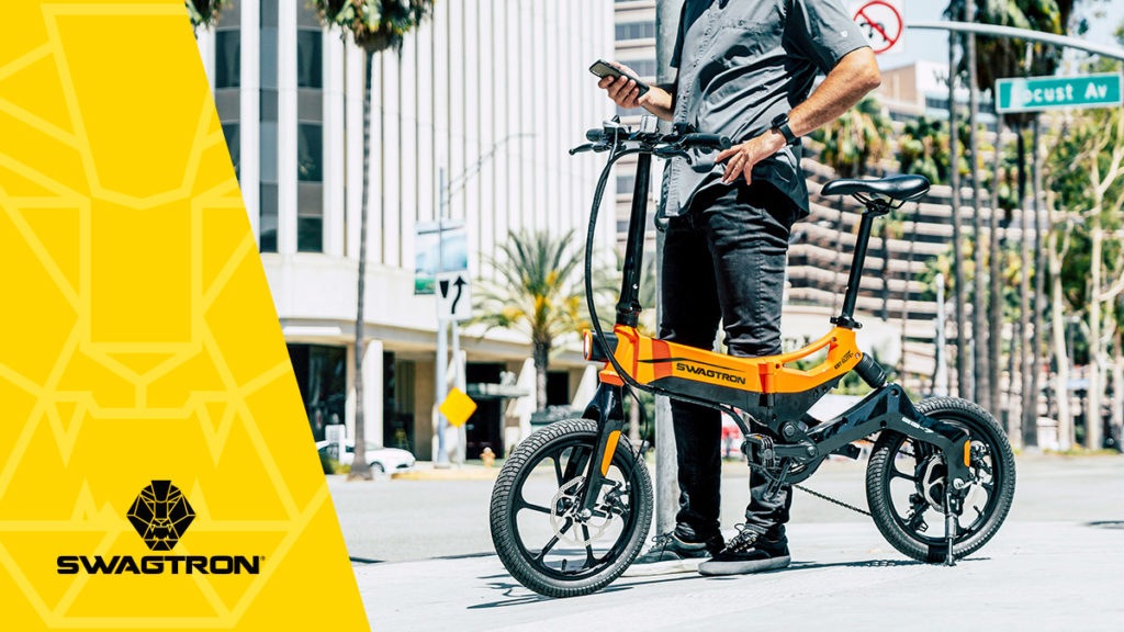 Man standing next to his EB7 Plus eBike.