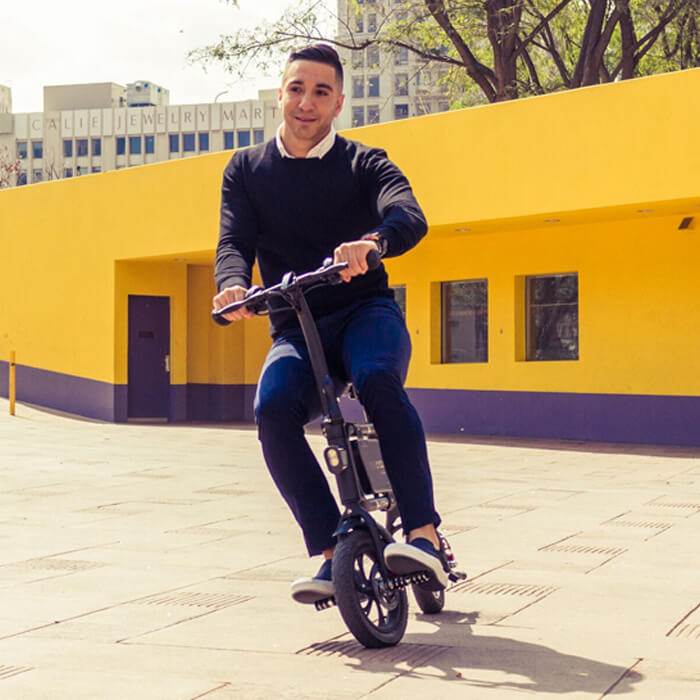 Guy riding his electric bike Swagcycle Pro in downtown LA