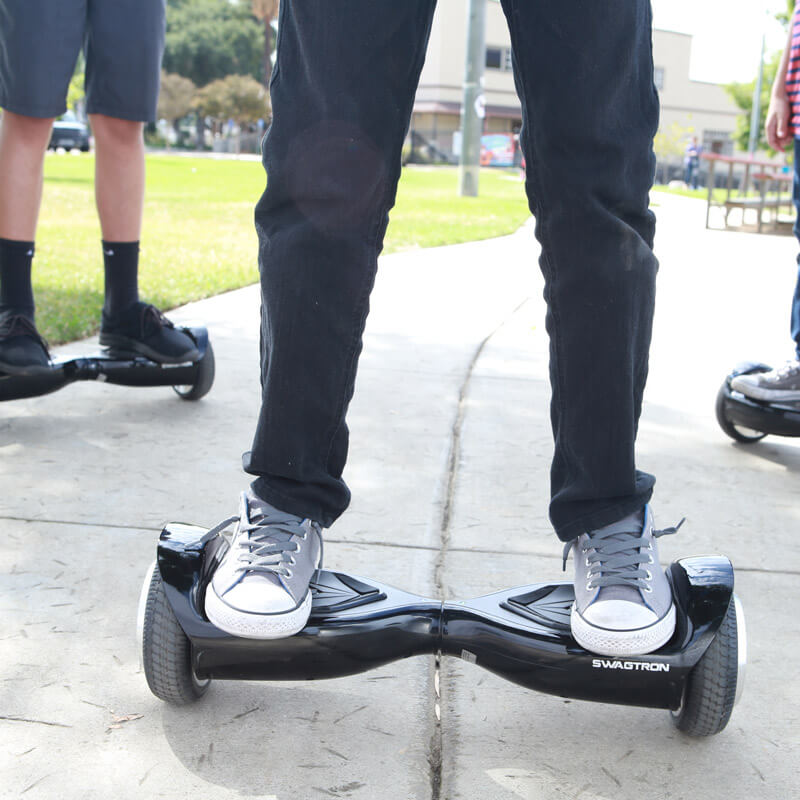 Kids riding in the park with their swagtron hoverboard T5 classic